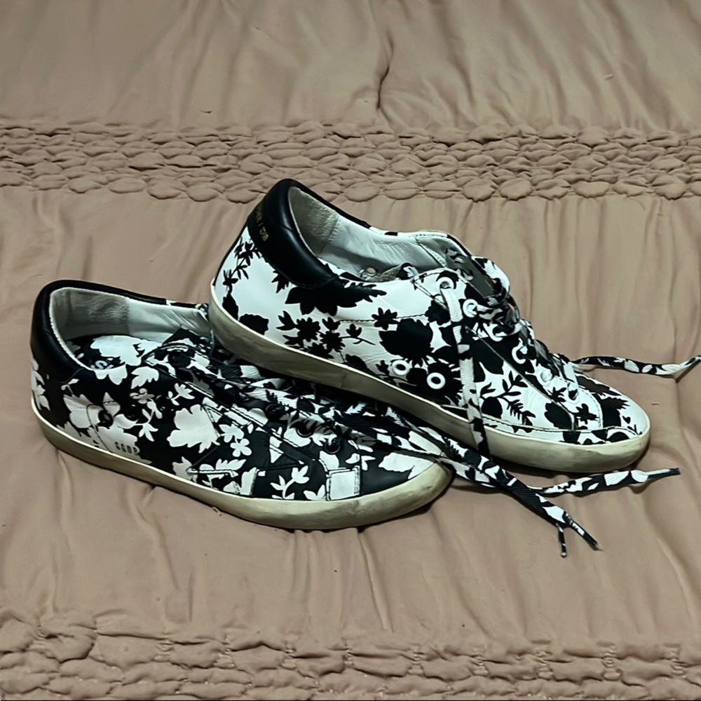 Golden Goose Black and White Sneakers Artistic Design